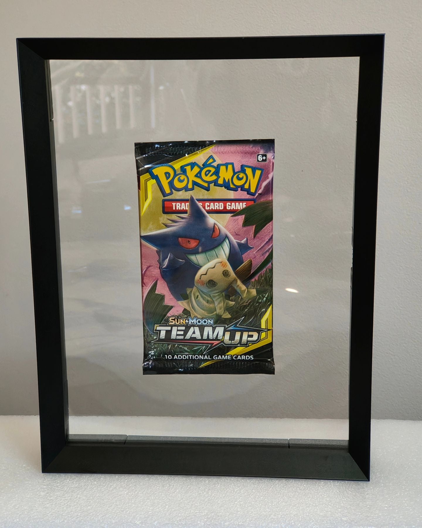 Framed Sealed Team Up Gengar and Mimikyu Pack